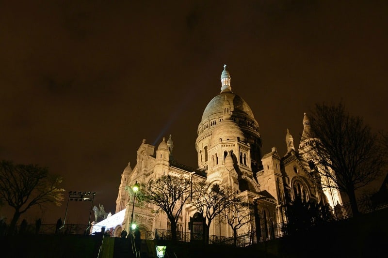The Sacre Couer cathedral at night in Paris