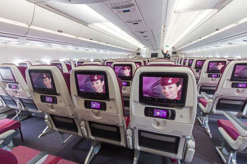The inside of a qatar airways plane