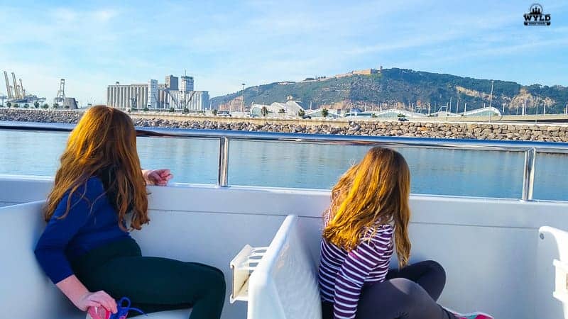 kids enjoying a cruise around the harbour in barcalona