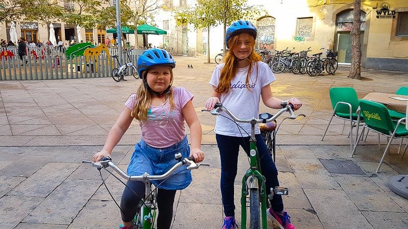 kids on a family bike ride through Barcelona
