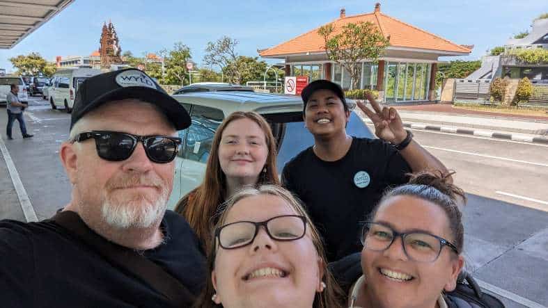 a bali driver with a family