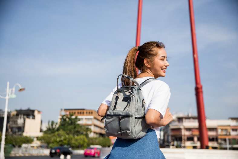 a teenager exploring the dynamic cityscape of Bangkok, Thailand