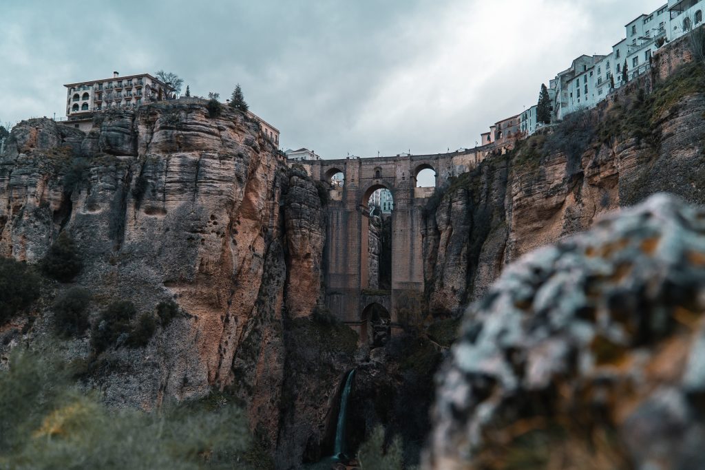 Ancient city bridge spanning 2 rock formations in Ronda