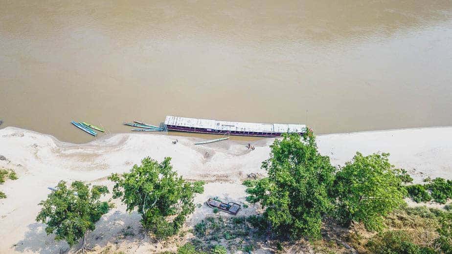 Drone shot of a boat on the Mekong in Loas