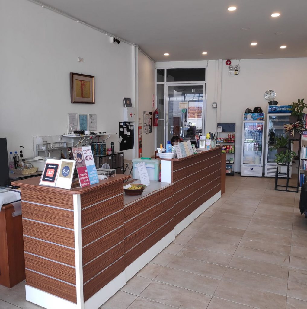 the front desk reception area at our hostel in Chinag Rai