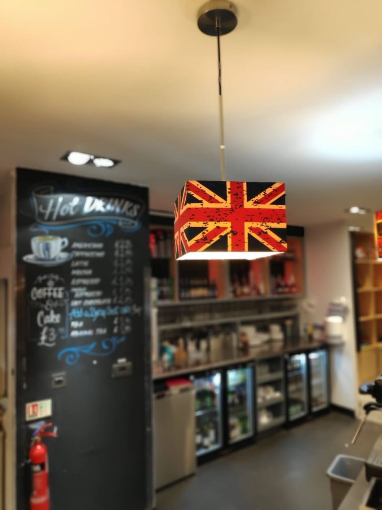 bar area of YHA central London with the totally cool Union Jack light shades that hang from the ceiling