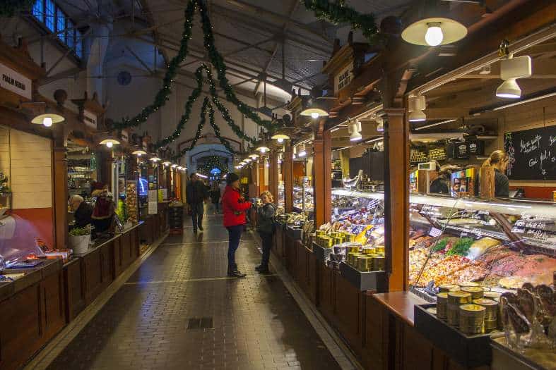 shopping for local finnish cuisine at the market hall in Helsinki