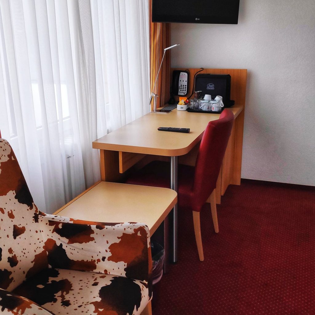 chairs and tables in a hotel room in Zurich