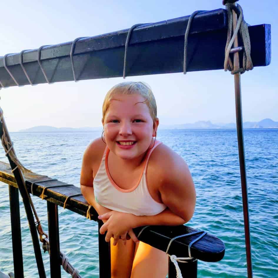 A kid enjoying the mesmerizing Krabi sunset tour
