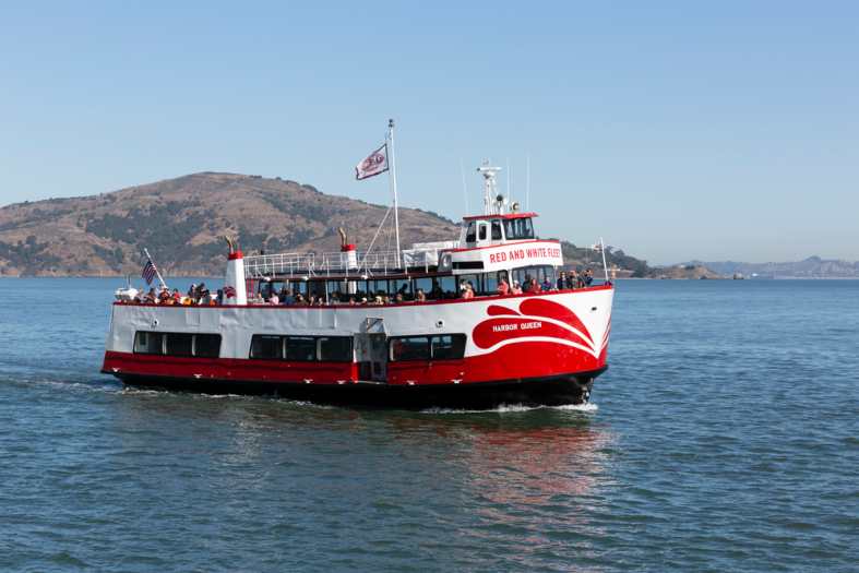 a boat on the water in San Francisco bay showing tourist around