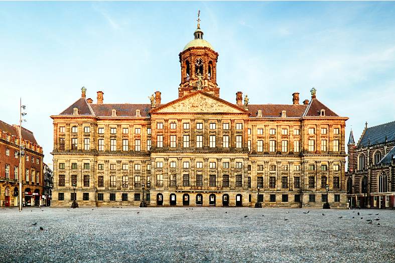The Royal Palace in Dam Square in Amsterdam standing with an empty forecourt in front