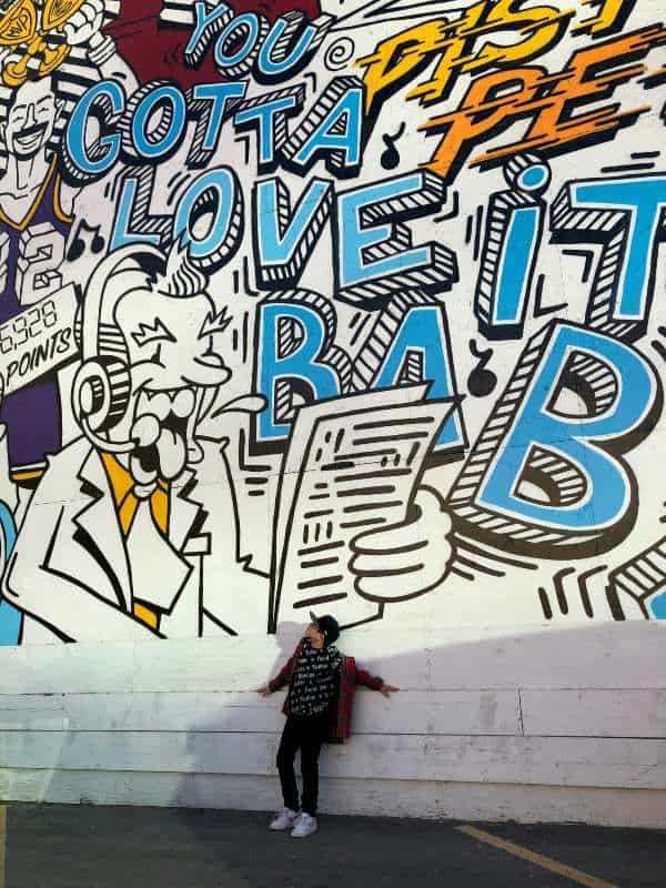 a teenager exploring street art on the weekend in Salt Lake City