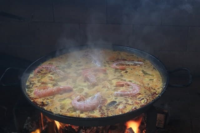 seafood and rice cooking in Barcelona spain