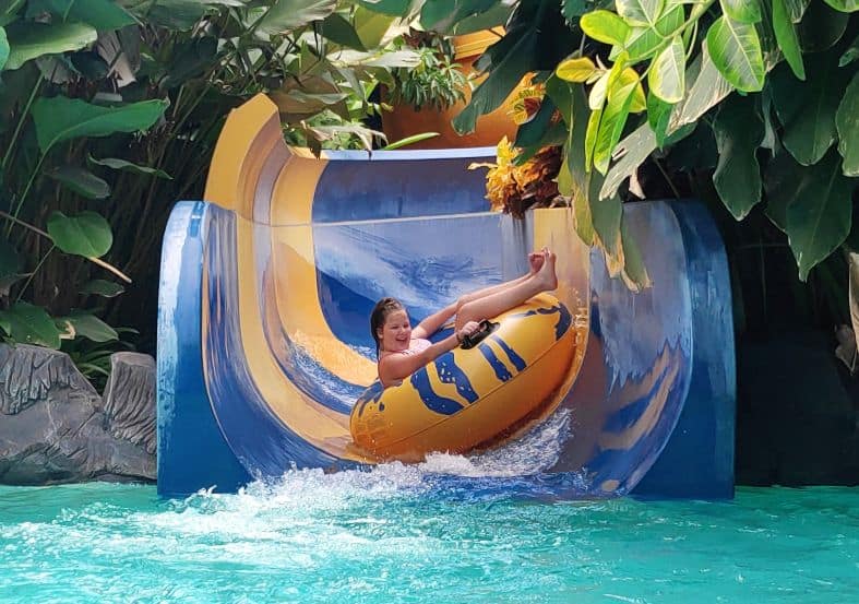 A child having fun on a waterslide at Lovina in North Bali