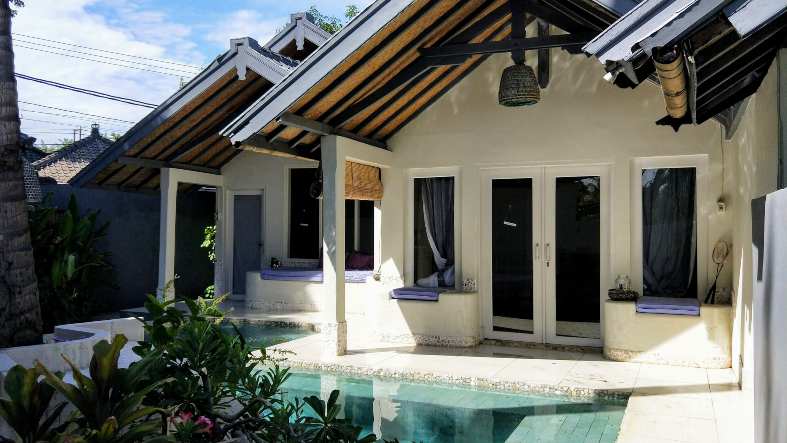 A white villa with private pool at Lilan Lovina Beach ion North Bali