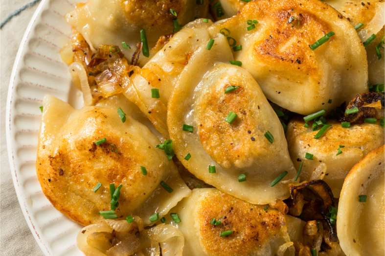 A plate filled with Pol;ish Pierogi