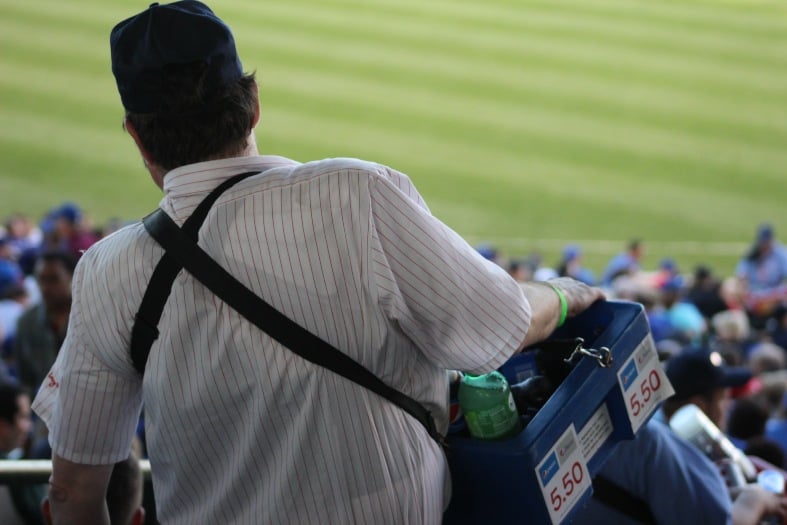 a man selling food at a sports event in Chicago