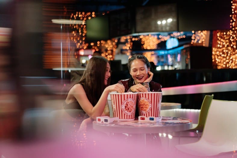 2 young girls going to the cinema