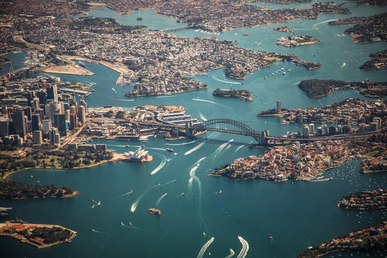 An epic view of Sydney from the air with the Harbour Bridge in the centre. Climbing the Sydney Harbour is one fo the best things to do in Sydney with teenagers