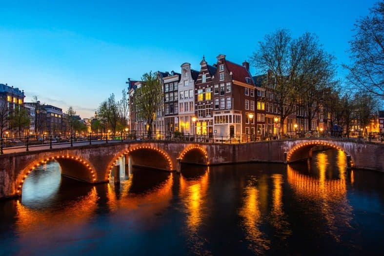 a bridge in Amsterdam illuminated at night