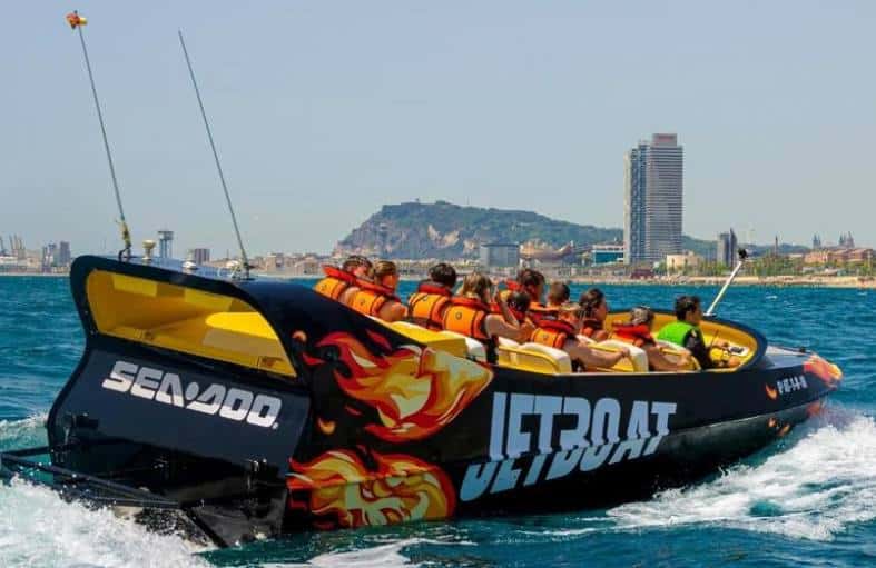 a jet boat in the water at Port Forum Barcelona