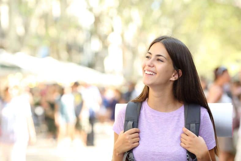 A teenage girl walking the famous La Rambla street in Barcelona