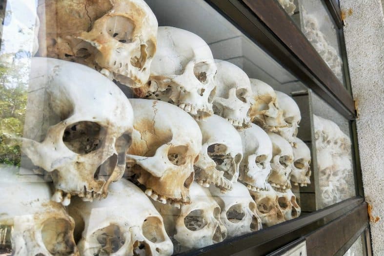 Skulls in a display case at the killing fields in Cambodia