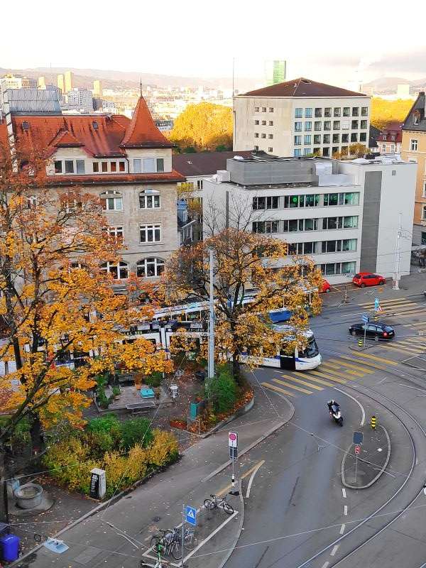 A tram making its way through Zurich Old Town city centre