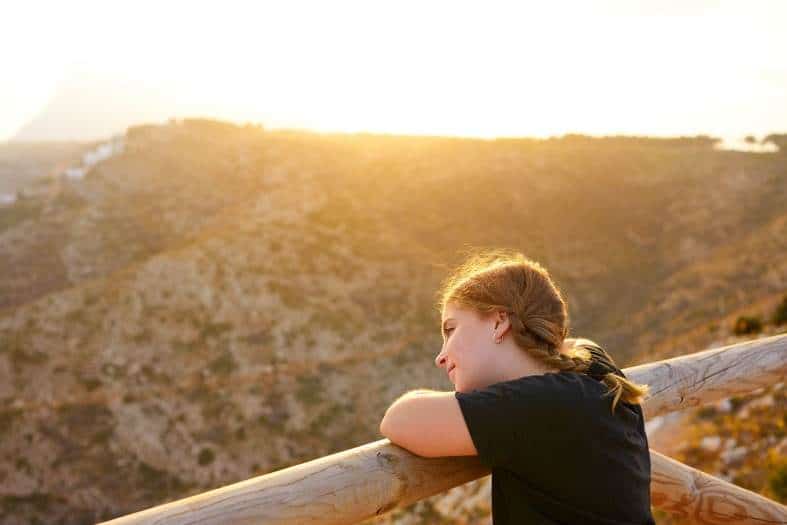 A teenage girl looking at the scenery when hiking in and around San Antonio texas