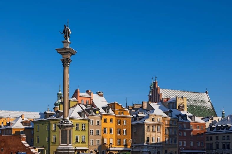The Warsaw old town buildings covered in snow