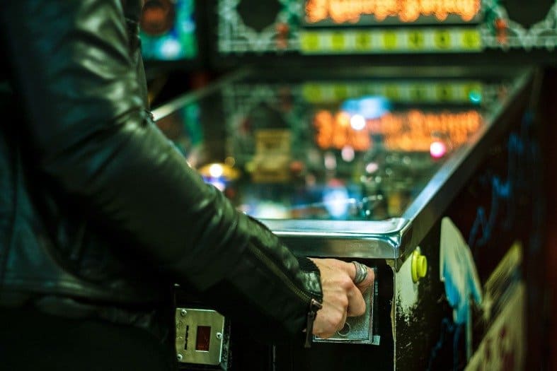 playing old fashioned pinball machines in Warsaw