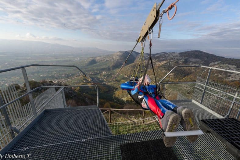 A teenage suited and strapped in ready to fly down a zip line near Rome