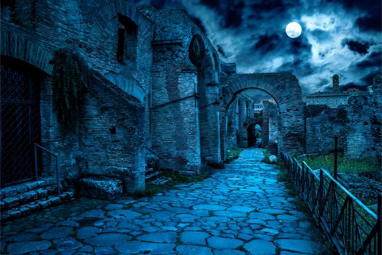 a sppoky night in rome with a full moon