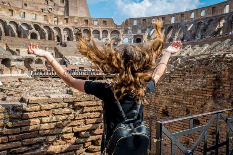 teenage girl in Rome at the Collosseum