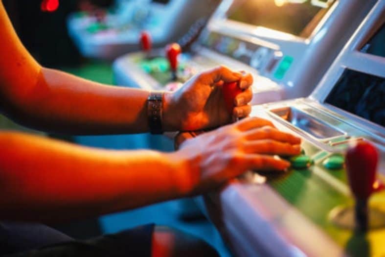 Teenagers in Toronto playing arcade games