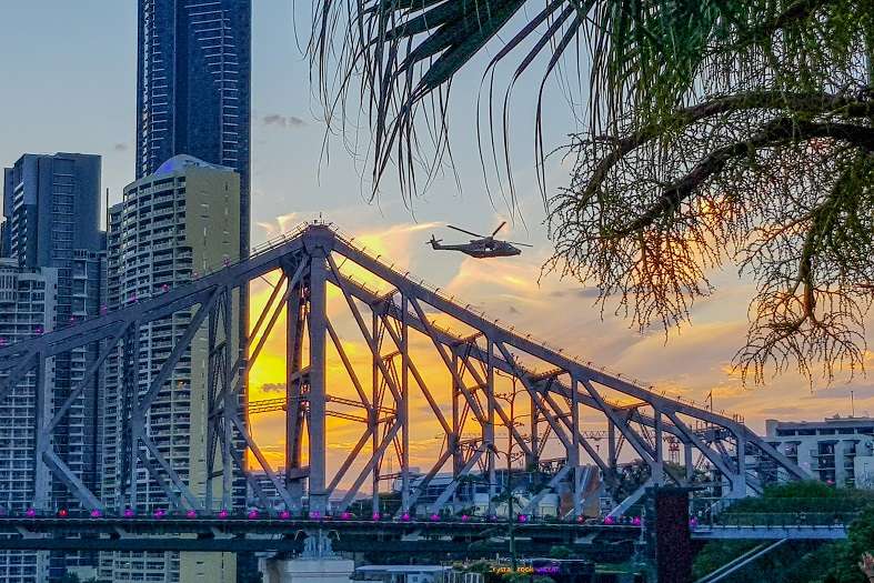 A magnificent view of the iconic Story Bridge spanning across the Brisbane River in Brisbane, Queensland