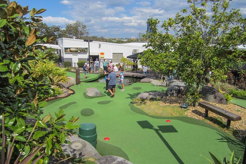 colorful and whimsical mini golf course with various obstacles and challenges at at Victoria Park Mini Golf in Brisbane, Queensland