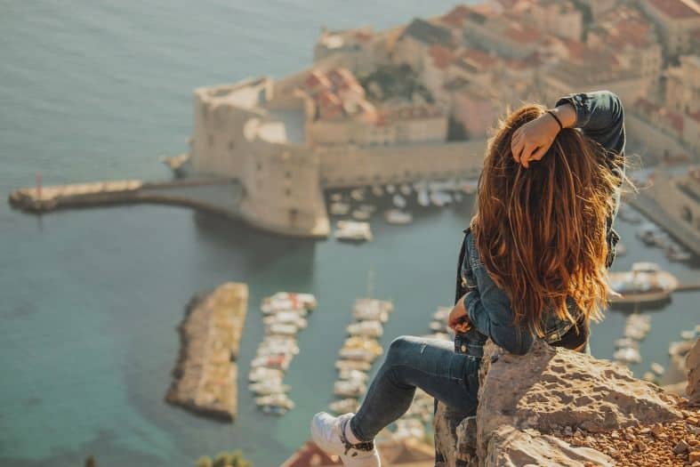 A teenage girl looking down on Dubrovnik.