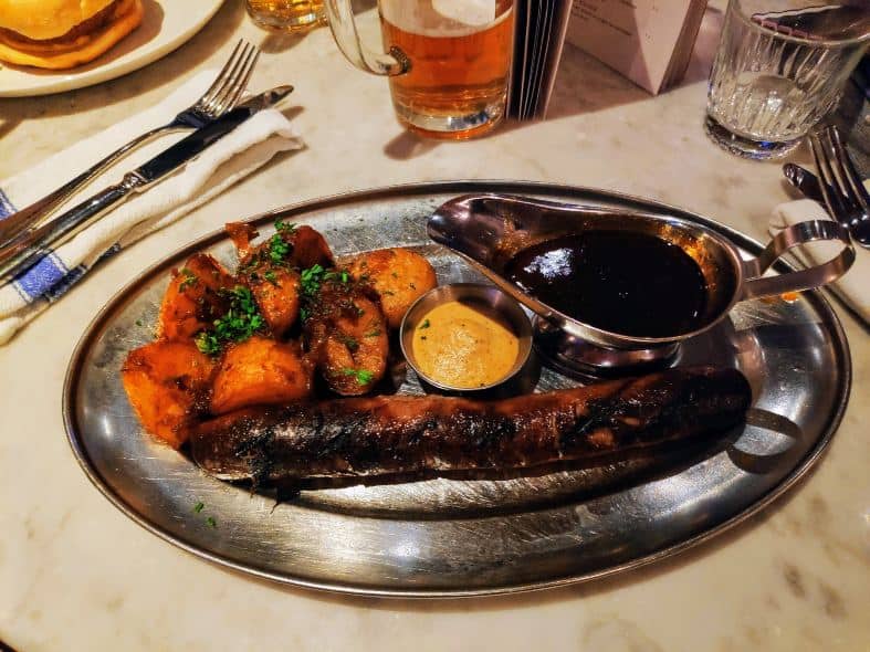 sausages, potaoes and sauce at the German restaurant Albert Schloss in manchester