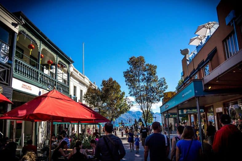 people walking through the Queenstown city centre
