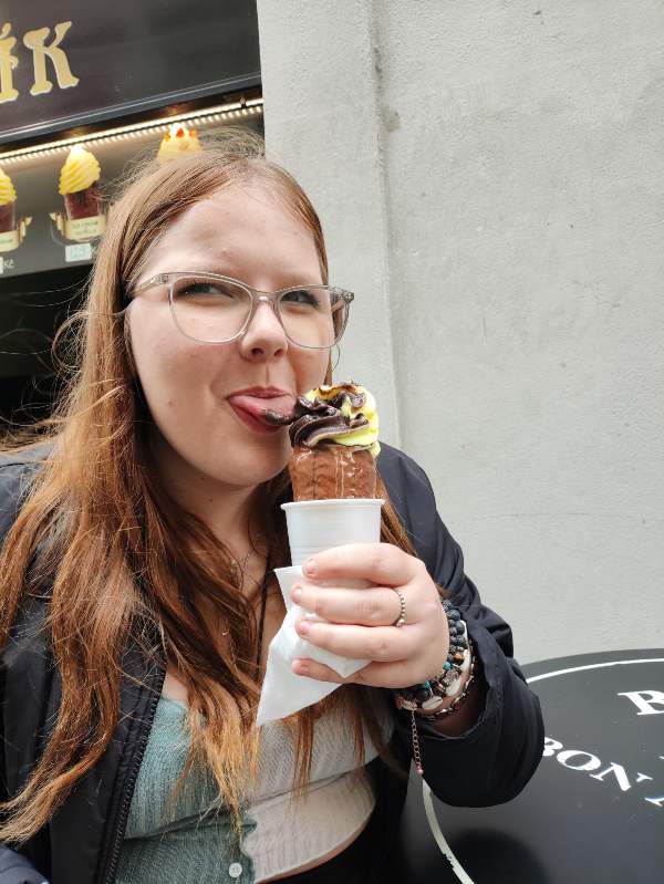 eating a chimney cake with ice cream in prague
