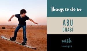 Cover image with boy in sandunes in Abu Dhabi