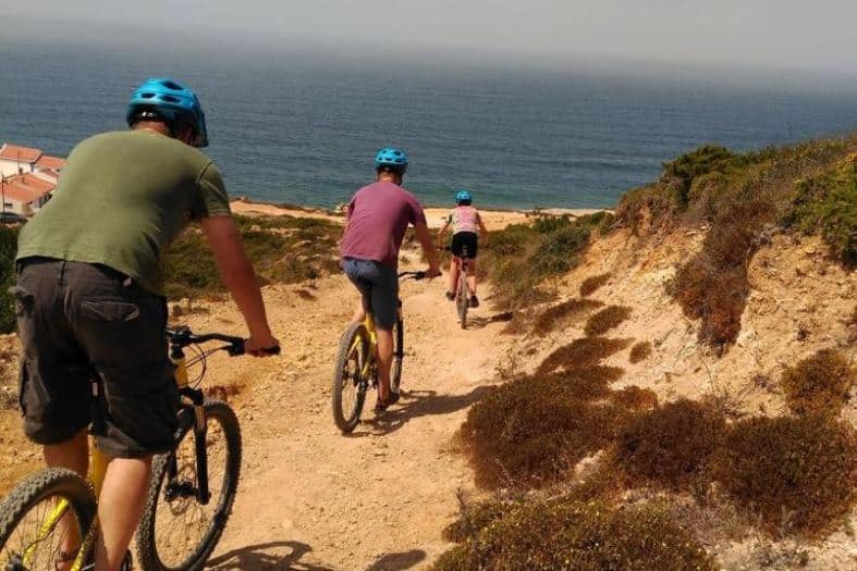 mountain biking by the beach in Portugal