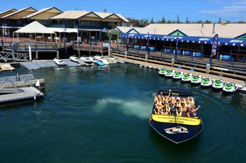 a jetboat pulling out from the Gold Coast harbour