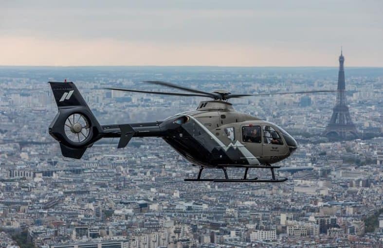 A breathtaking aerial view of Paris captured during a thrilling helicopter ride