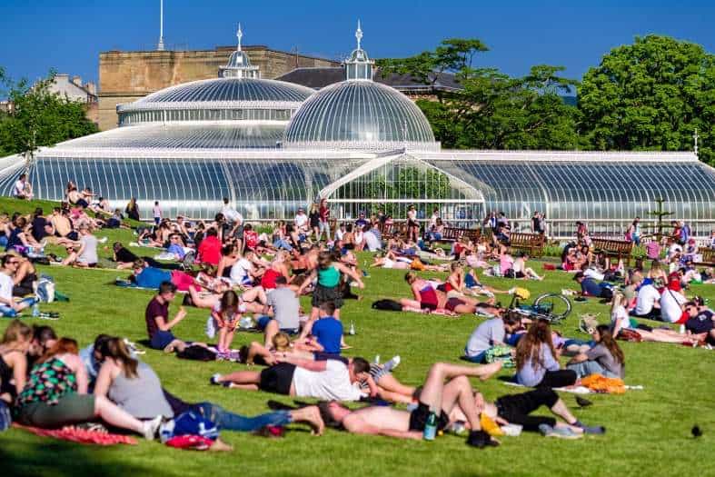 people hanging out in a park in Glasgow
