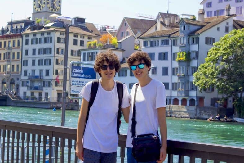 by the river in Zurich Switzerland with teenagers