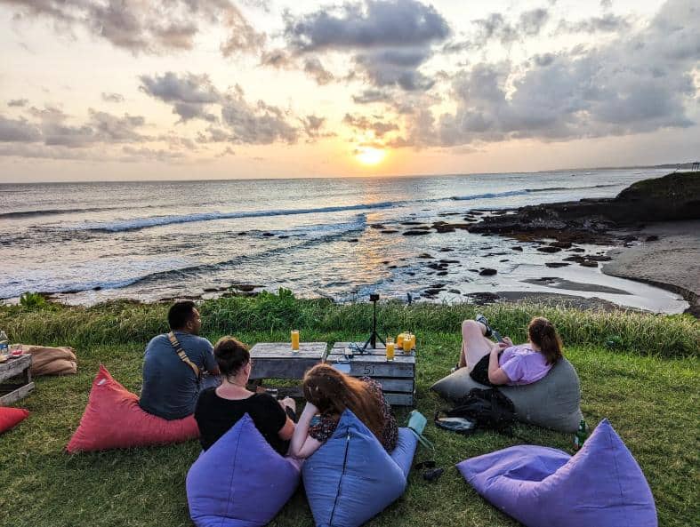 sitting on a hill in Bali waiting for sunset