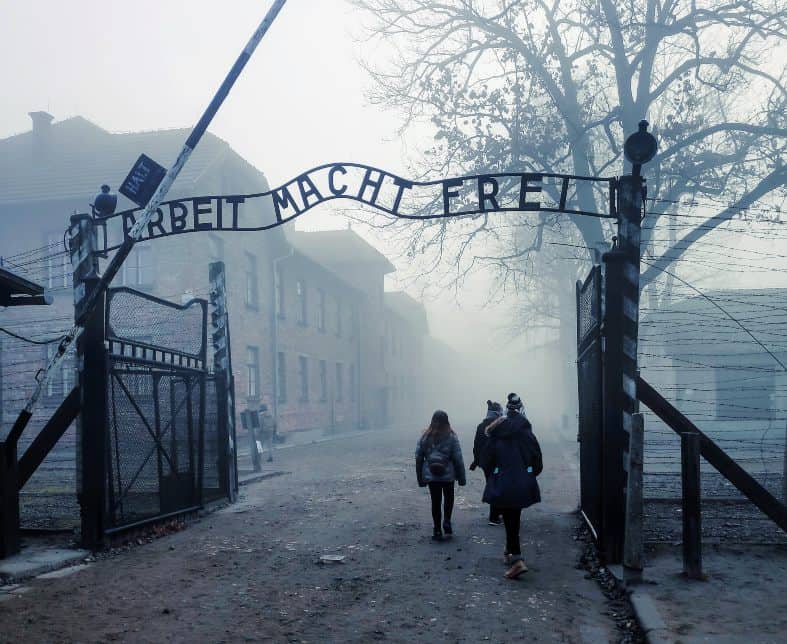 Visiting Auschwitz in the early morning there can be a fog that sits over the buildings like in this photo.