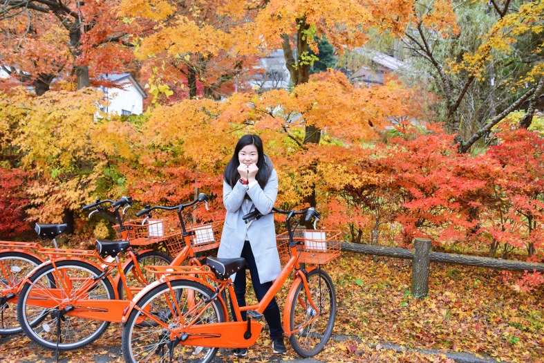 a girl who has been bike riding in Kyoto
